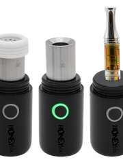 Load image into Gallery viewer, HoneyStick Lil Ripper E-Rig, a black and silver portable vaporizer with visible glass mouthpiece, designed for wax and dry herb use.