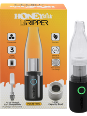 Load image into Gallery viewer, HoneyStick Lil Ripper E-Rig in packaging, showcasing its sleek black and silver design with accessories visible, tailored for wax and dry herb vaping.